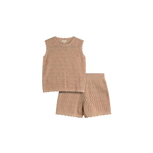 A knitted sleeveless top and shorts set in a beige color. The top features a diamond and zigzag pattern, alongside scalloped edges. It's laid on a plain light background.