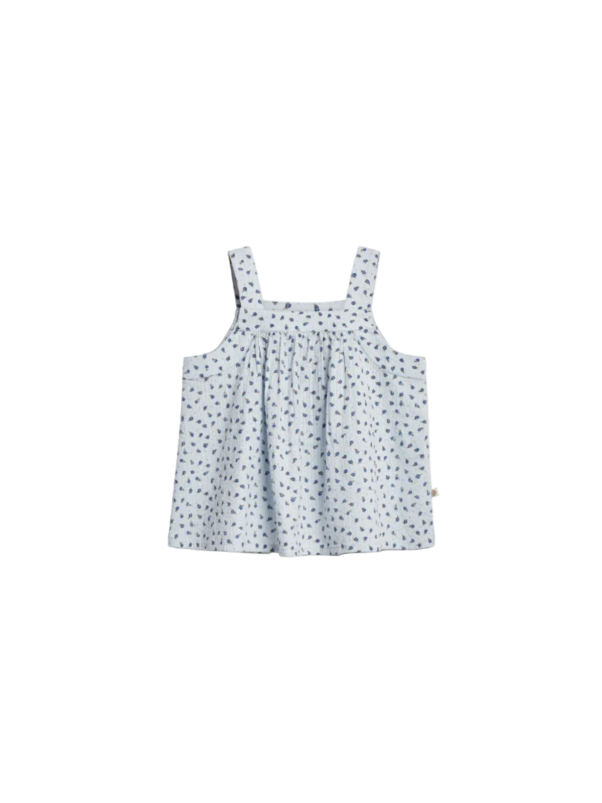 A light blue sleeveless top with thin straps, adorned with a pattern of small blue flowers, displayed against a plain white background.