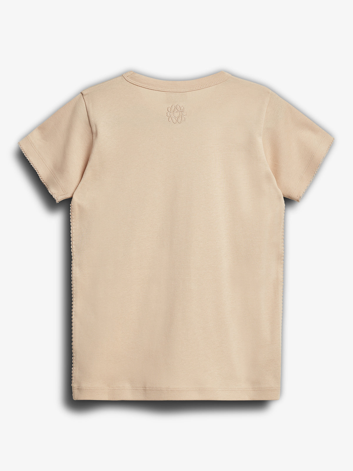 Tan T-shirt displayed flat with short sleeves against a white background. A small, intricate emblem is located near the neckline on the back.