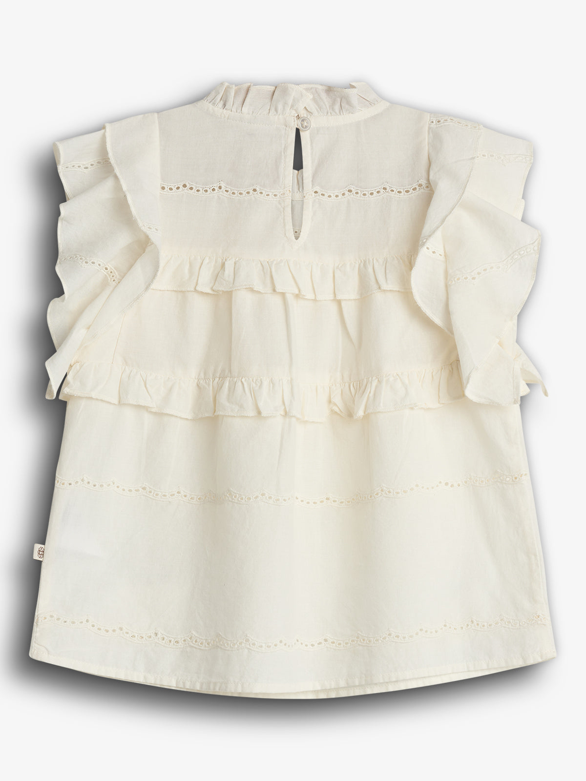 Cream-colored sleeveless blouse with ruffled sleeves, delicate lace trim, and button closure at the back neckline, displayed on a plain background.